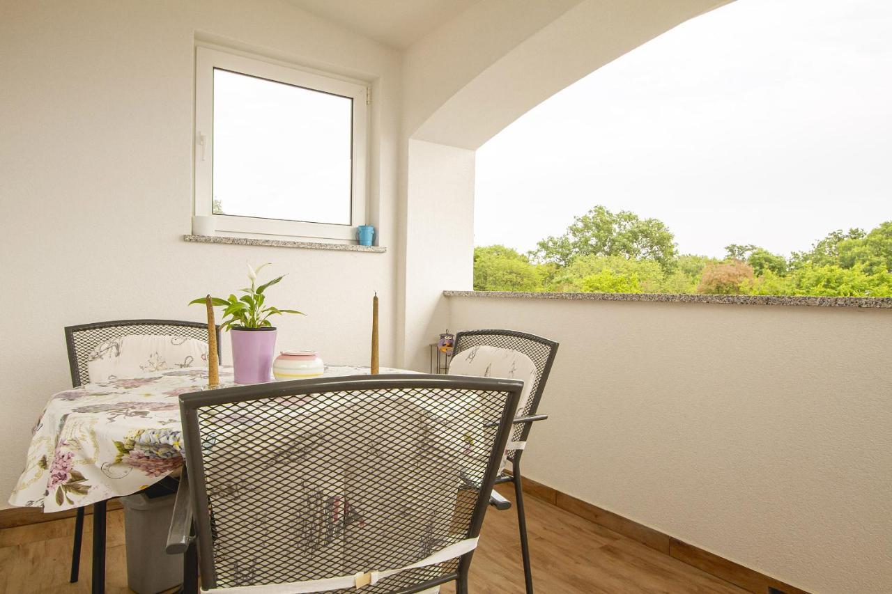 Apartmani Justic Njivice Buitenkant foto